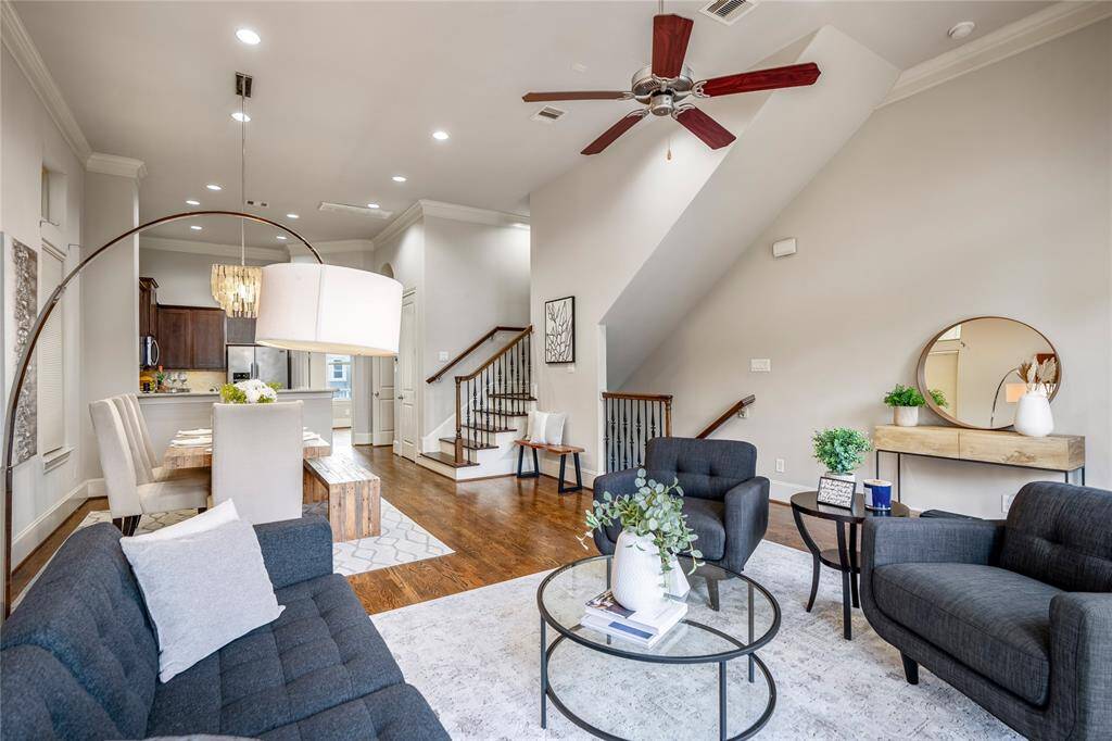 A look at the flow between the living room, dining room, and the kitchen. Perfect layout for entertaining.
