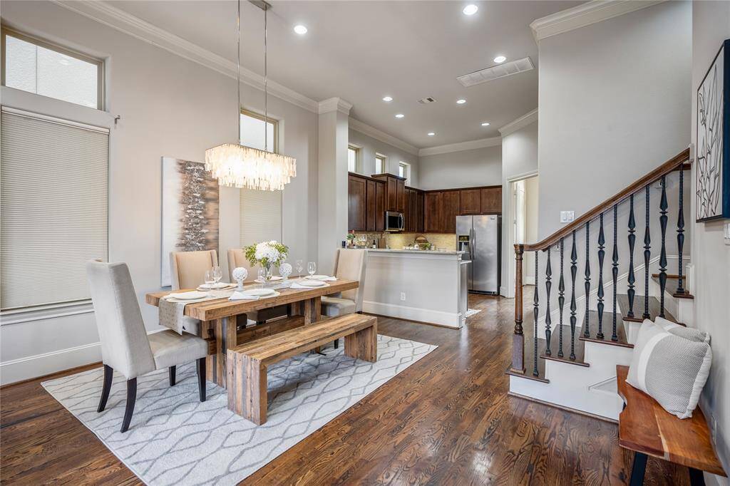 A closer look at the dining room that can fit your longest table to seat 10-12.