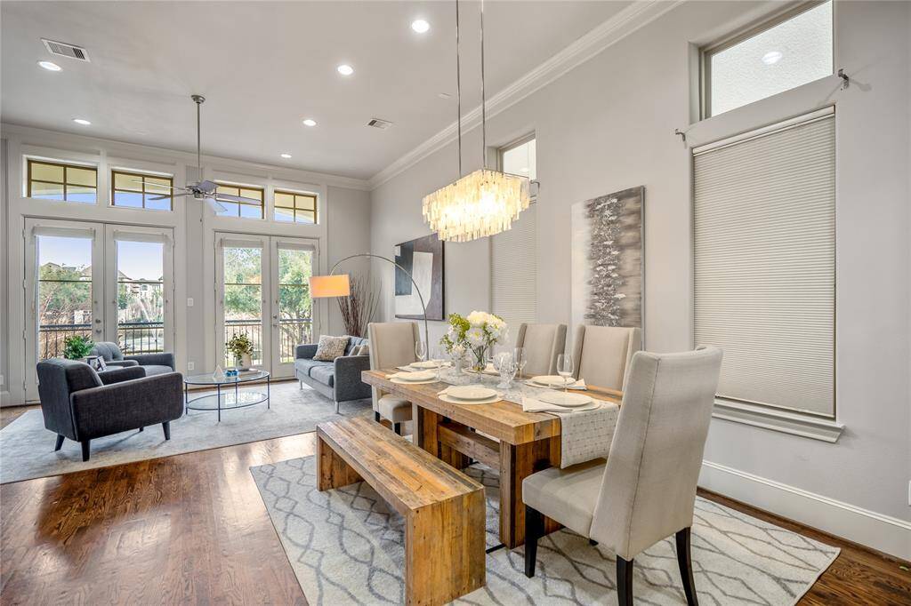 The dining space looking back into the living room. All recessed lighting in this home.