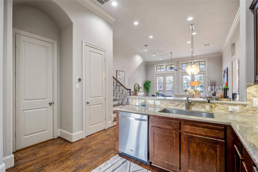 The first closed door on the left is the full-bathroom on this second floor. The other is the pantry.