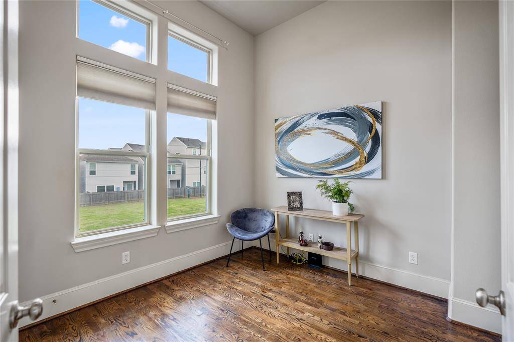 A look at the bedroom on this second floor overlooking the quiet backyard space. This bedroom features a walk-in closet.