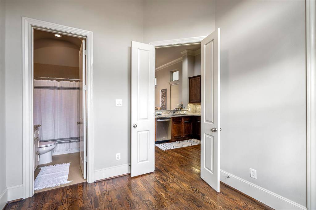 From inside this bedroom and its entry to the full bathroom.