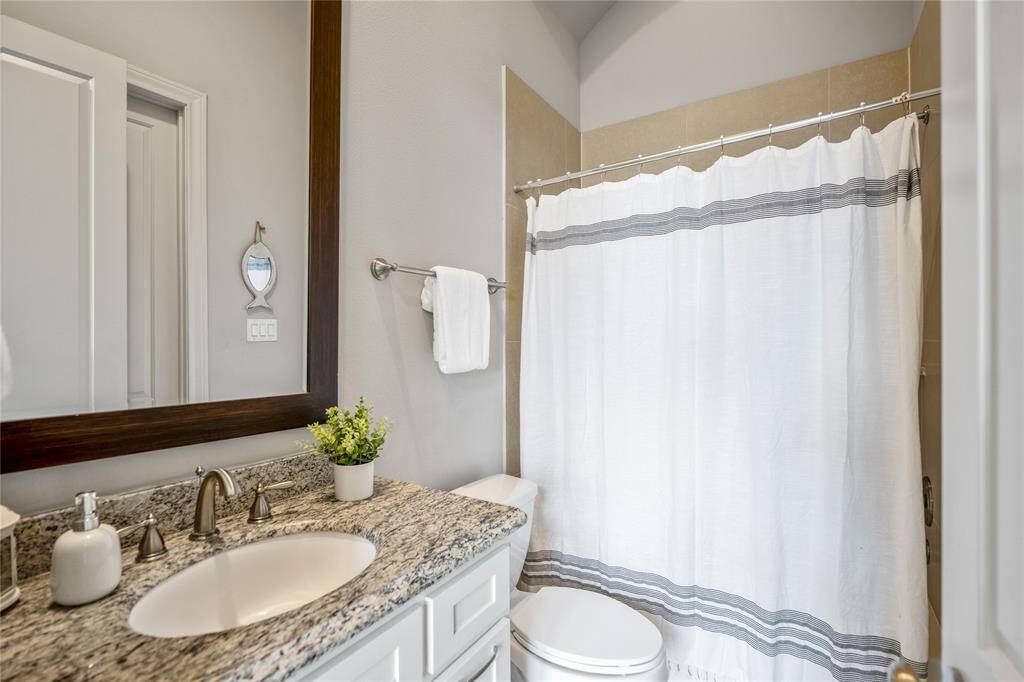 Full tub inside this second-floor bedroom.