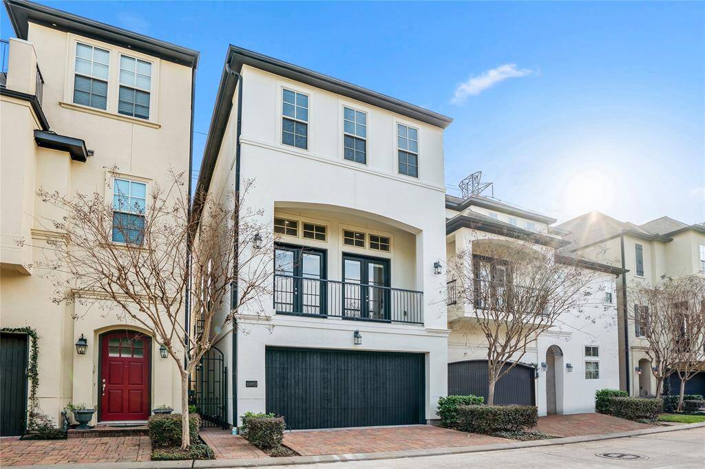 This gorgeous home has been meticulously maintained. Entry to the left of the garage.