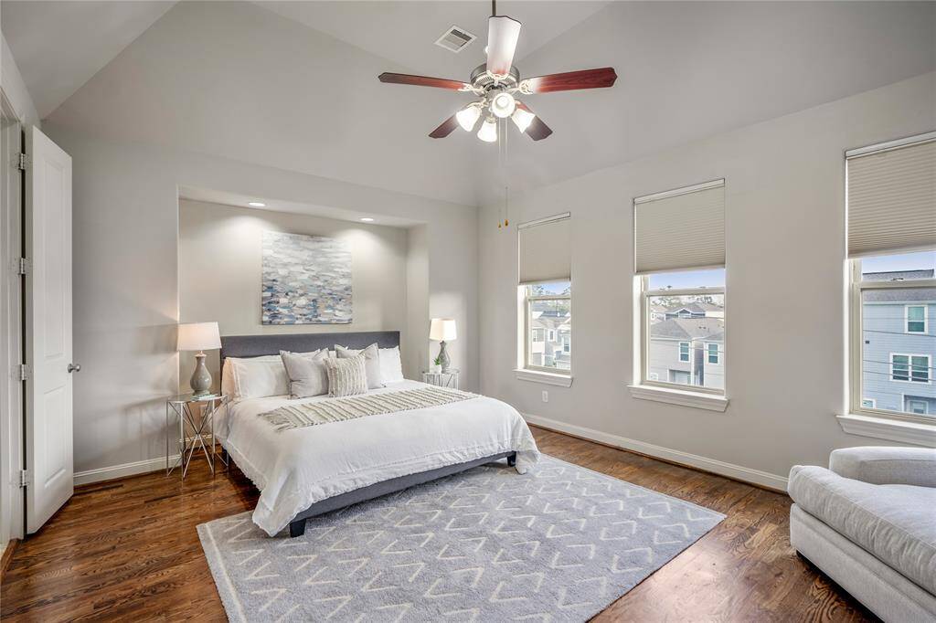 Welcome to this light and bright, spacious primary bedroom with ample natural light.