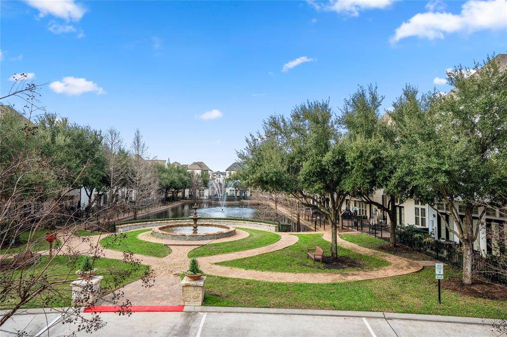 This is the view just across from this home. Unobstructed views of this beautiful community lake from your second floor covered balcony.