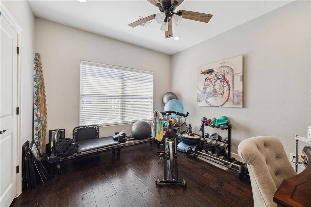 2ND OF 2 SECONDARY BEDROOMS UPSTAIRS - overlooking backyard, neutral decor, wood flooring, recessed lighting and ceiling fan with lights, 2 closets