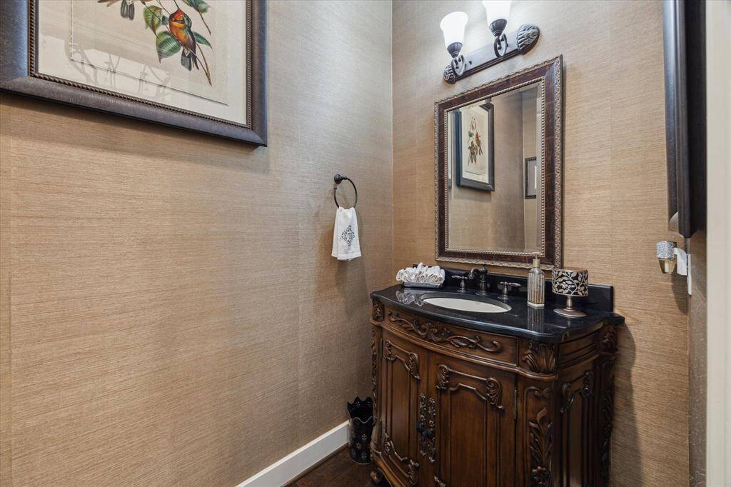 LARGE POWDER BATH DOWNSTAIRS - furniture-style cabinet for lavatory, elegant grass-cloth wallcovering