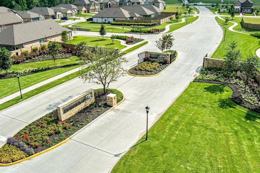Capturing the allure of one of two meticulously manicured community entrances, this photo invites you into a world of elegance and convenience. Commuters will appreciate the convenience of quick access to the Sam Houston Tollway and Highway 249. Embrace the proximity to popular shopping destinations such as Willow Brook Plaza, North Oaks Shopping Center, and Vintage Park. The nearby schools are part of the renowned Klein ISD.