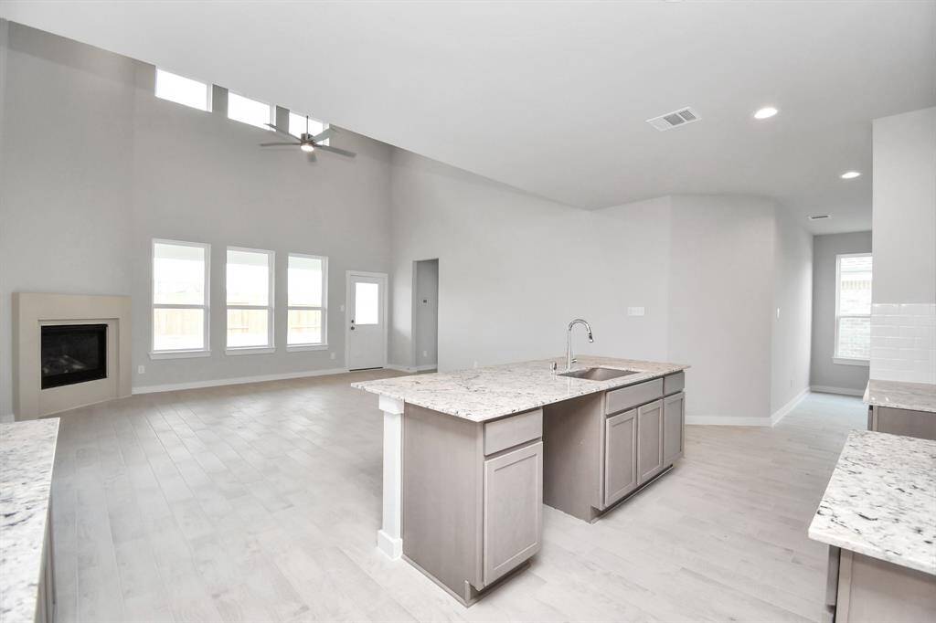 Sample photo of completed home with similar floor plan. Actual colors and selections may vary.