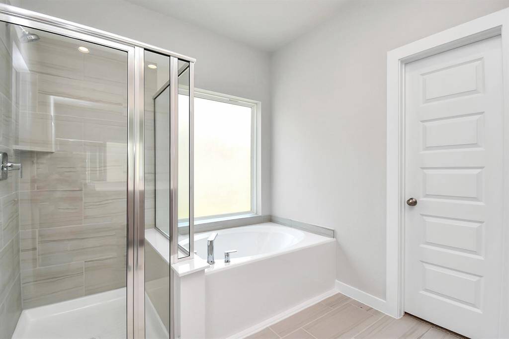 Sample photo of completed home with similar floor plan. Actual colors and selections may vary.