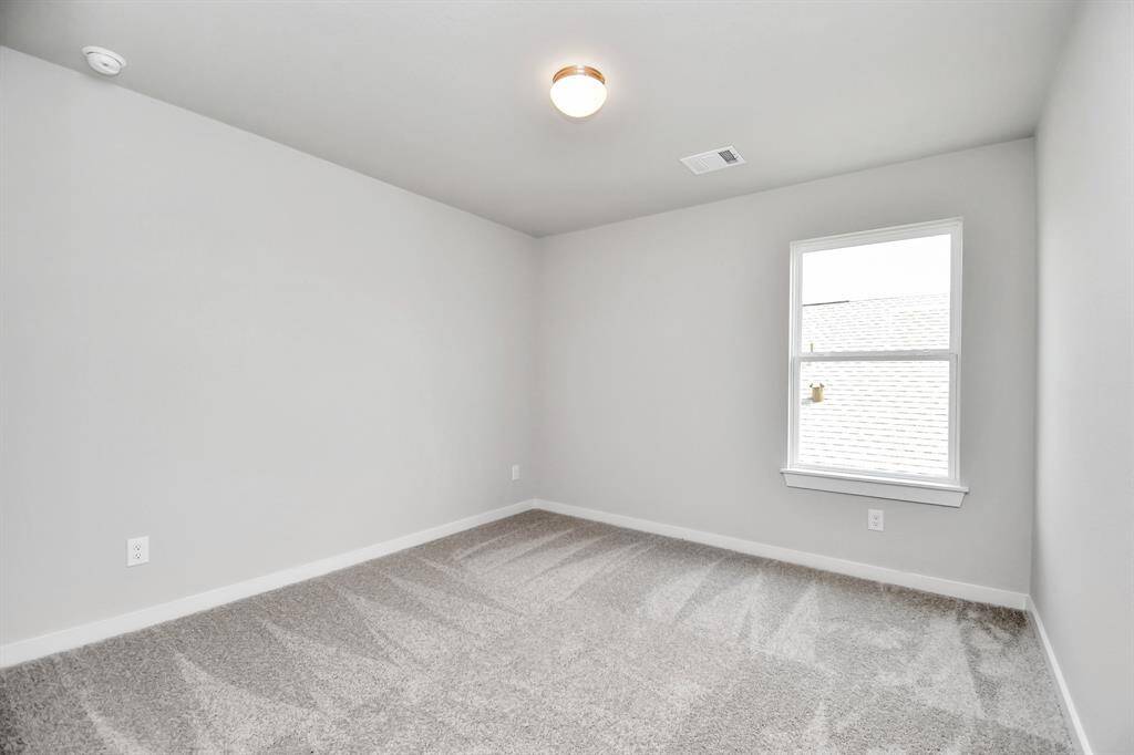 Sample photo of completed home with similar floor plan. Actual colors and selections may vary.