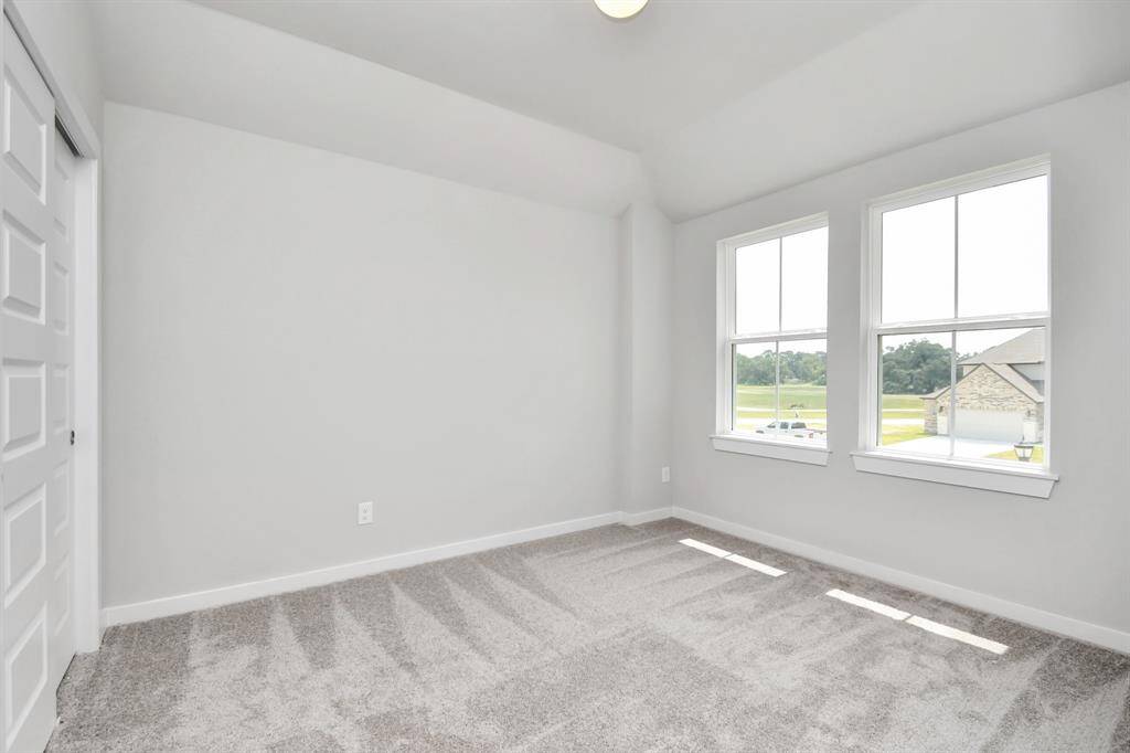 Sample photo of completed home with similar floor plan. Actual colors and selections may vary.