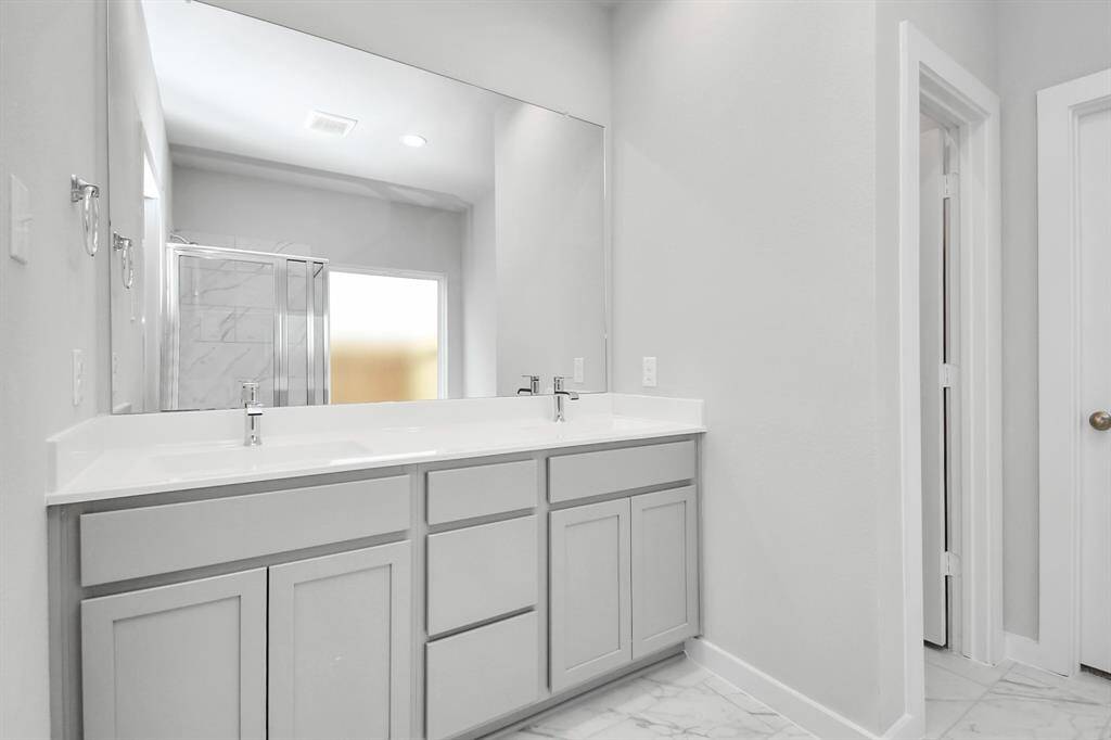 Sample photo of completed home with similar floor plan. Actual colors and selections may vary.