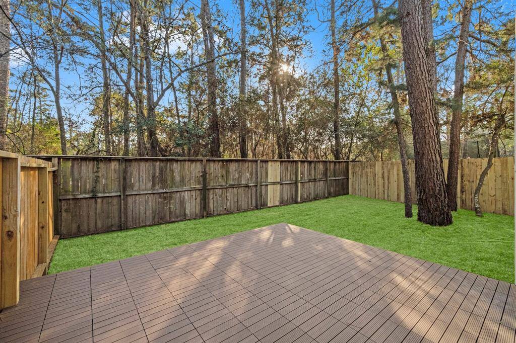 The backyard is ideal for relaxation and outdoor gatherings.