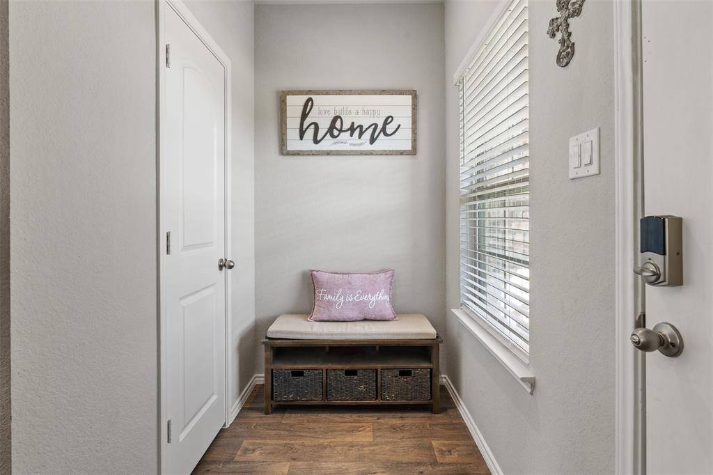 Front Foyer sitting area and coat closet