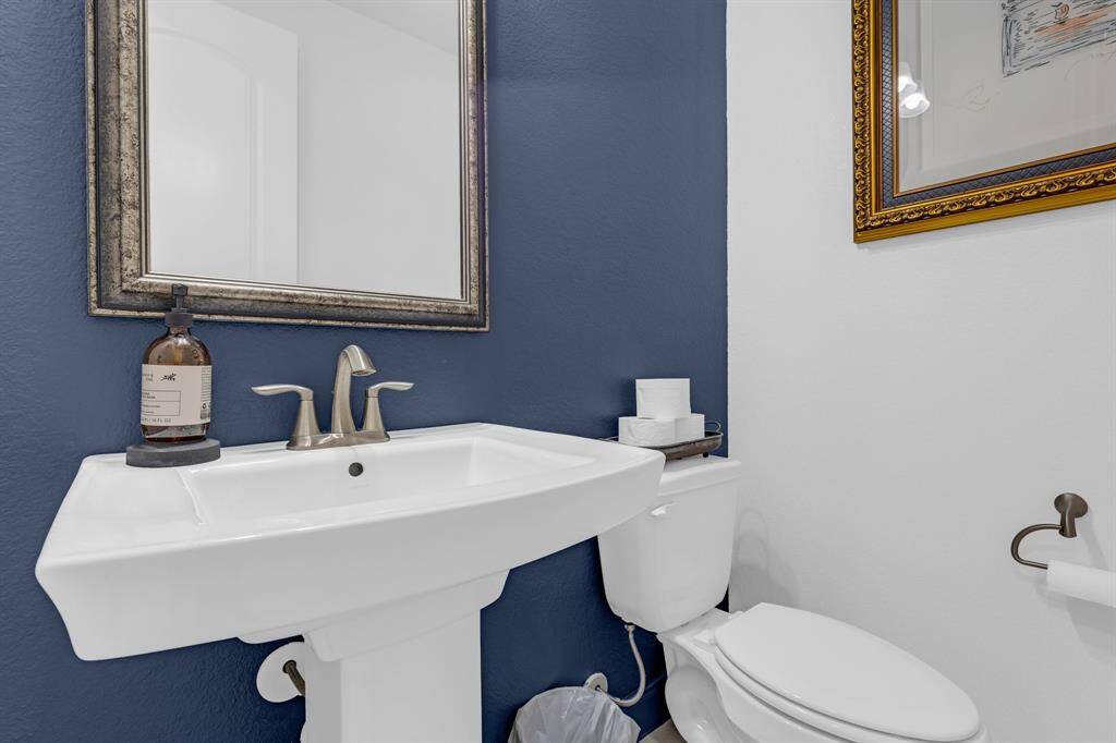 A conveniently located half bath just off of the family room.