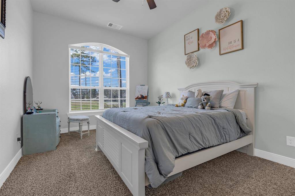 The fourth bedroom can be used as a guest room, a child’s bedroom, or a creative workspace. This room is both functional and inviting, making it a valuable asset to any home.