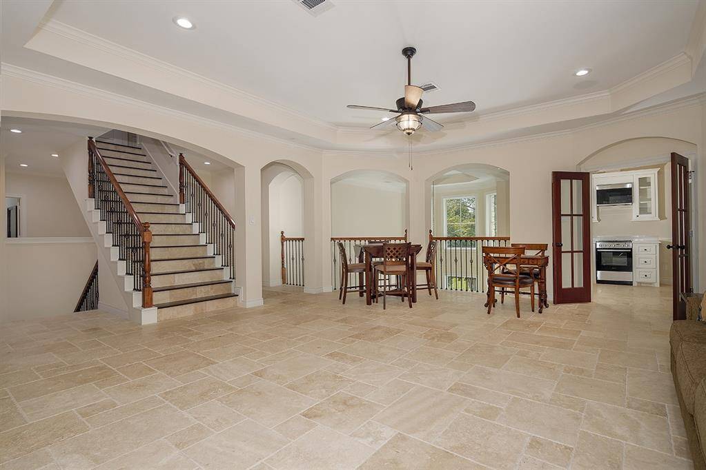 The spacious game room upstairs can host large gatherings for billiards, ping pong or family game night!
