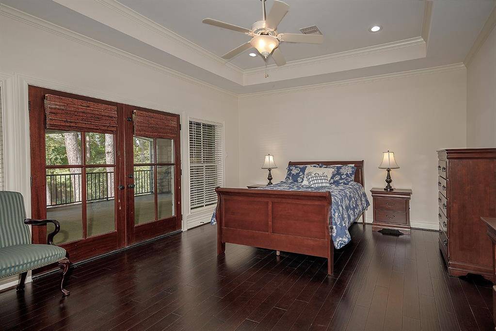 One of the 2nd floor bedrooms with an en-suite bath, walk-in closet and balcony