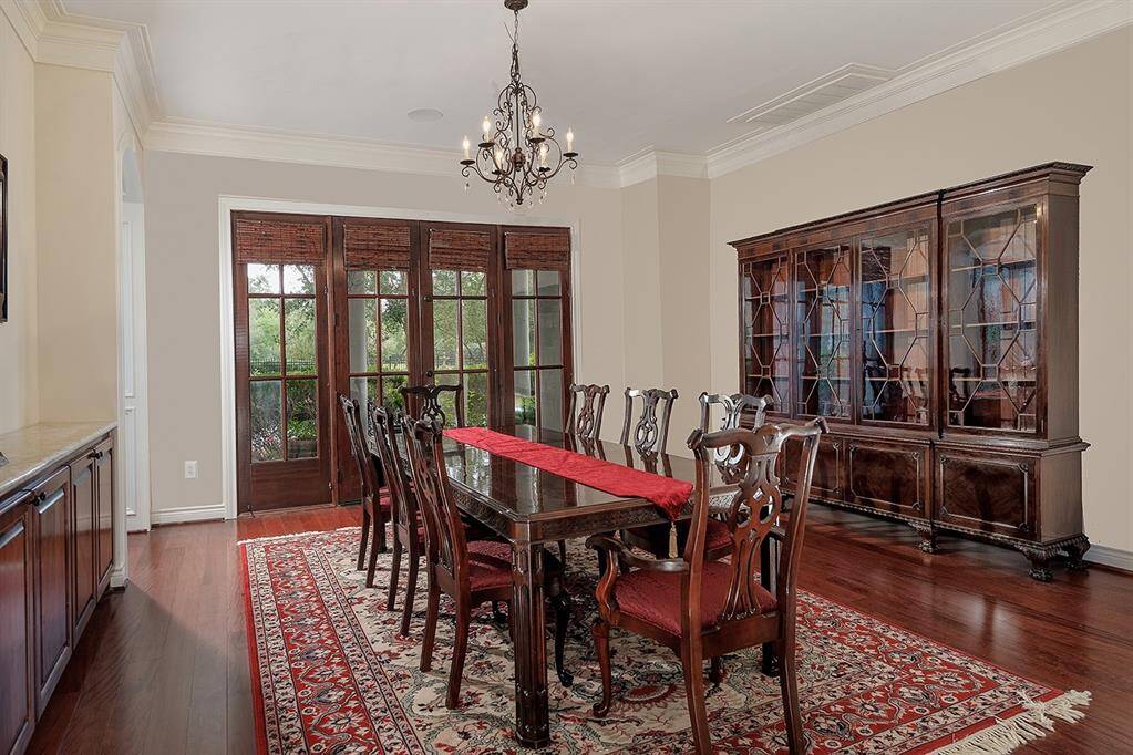 As you enter, the formal dining is to your left, and can accommodate many guests