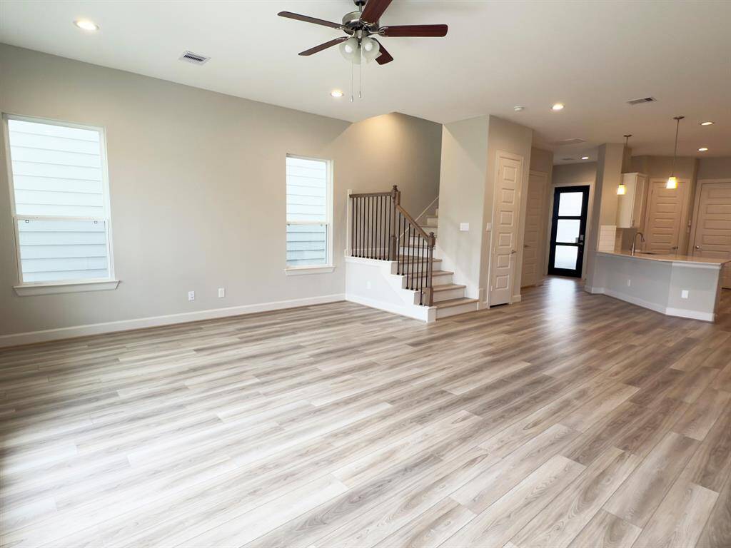 The ROCLake's living room was designed to be both elegant and versatile, allowing for various furniture layouts to suit the homeowner's lifestyle. Image depicts home as-is.
