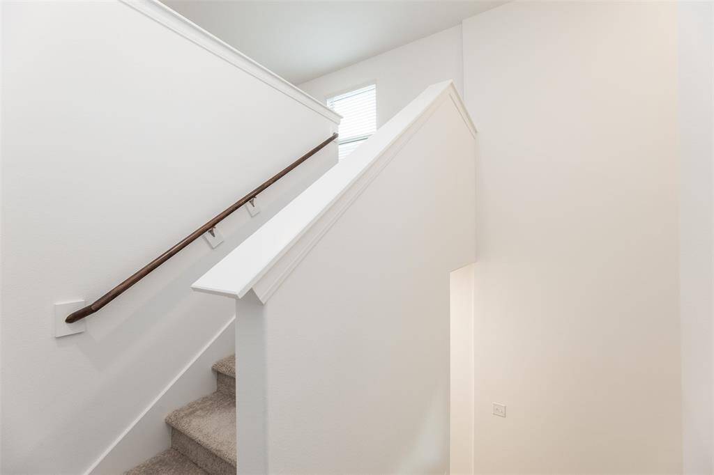 Let's go upstairs! Upstairs featured 3 bedrooms, full size bathroom, and game room.