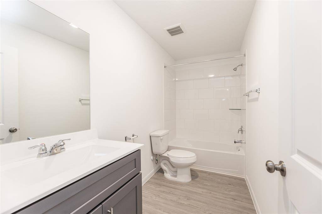 Full bathroom located upstairs.