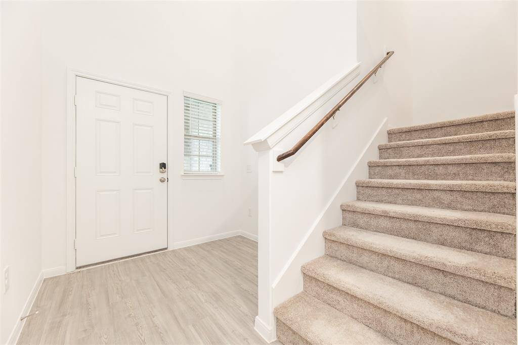 As you enter the home, to the left, you have a lots of space for an entryway table.