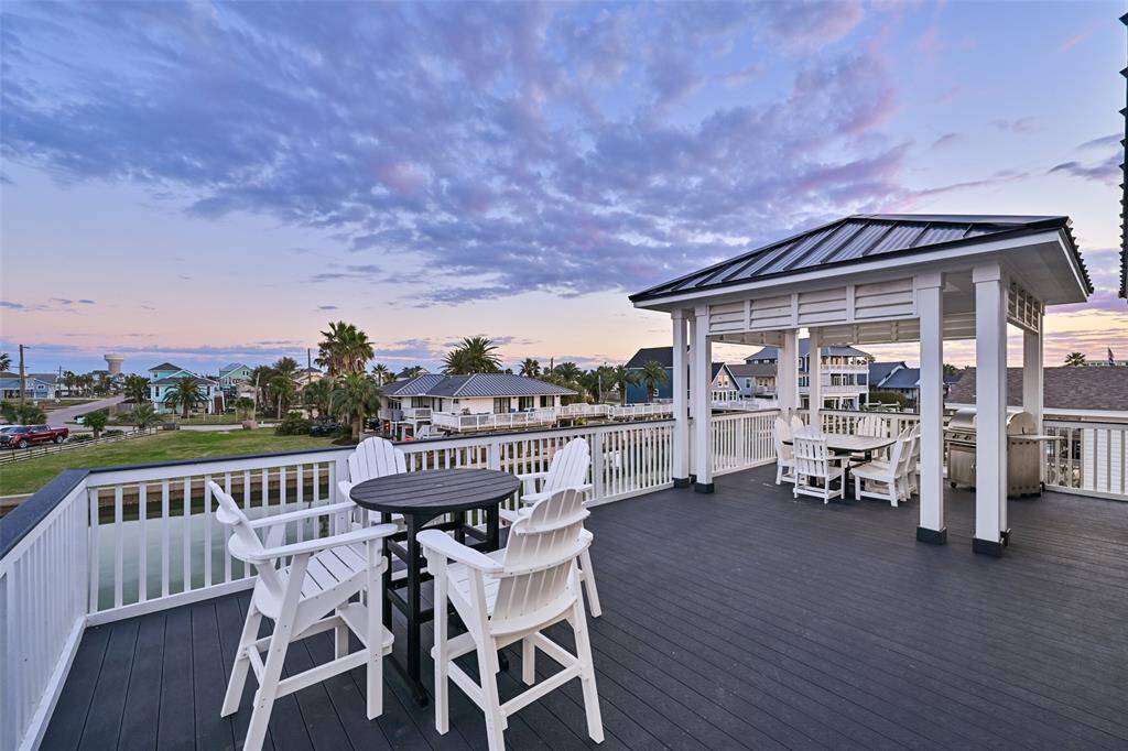 Large deck with multiple seating areas