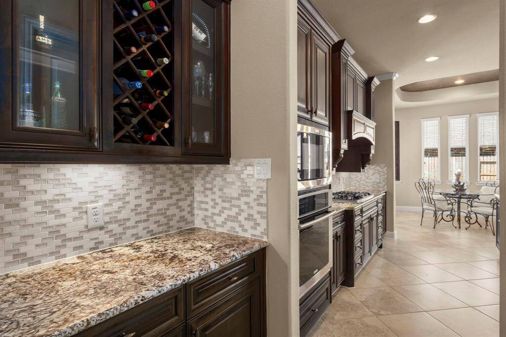 The butlers pantry between the dining room and kitchen offering a great space for your entertaining delights.