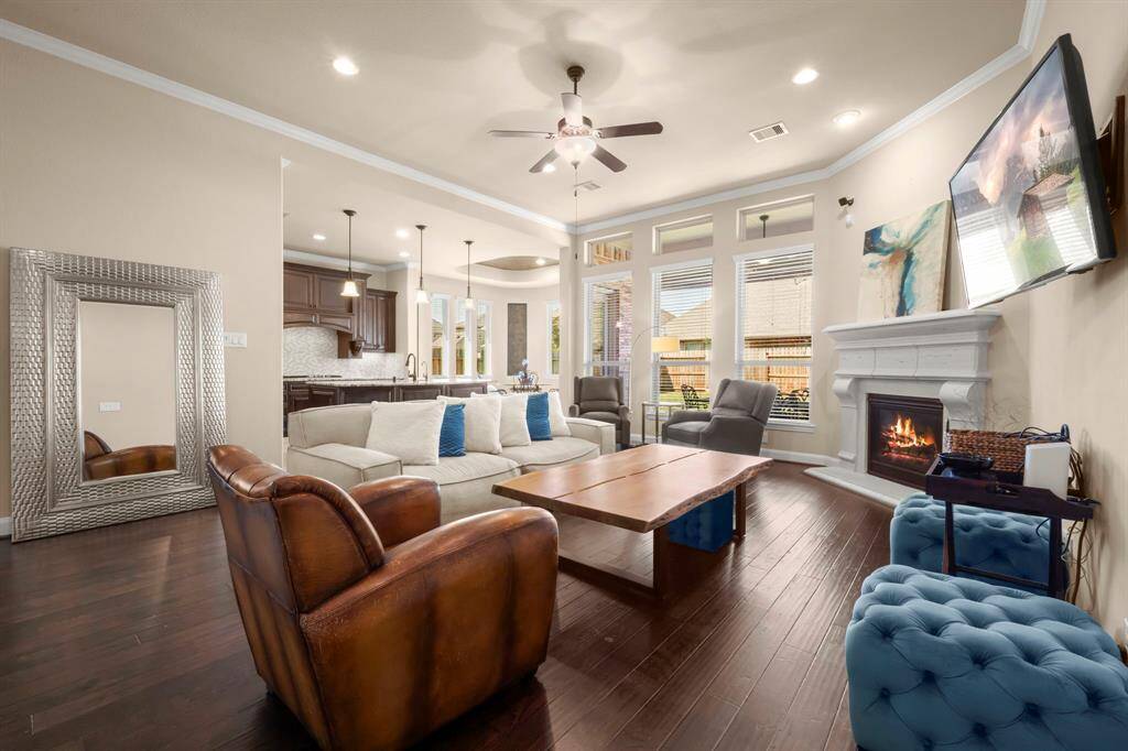 Large windows provide gorgeous backyard views and flood the space with natural light.