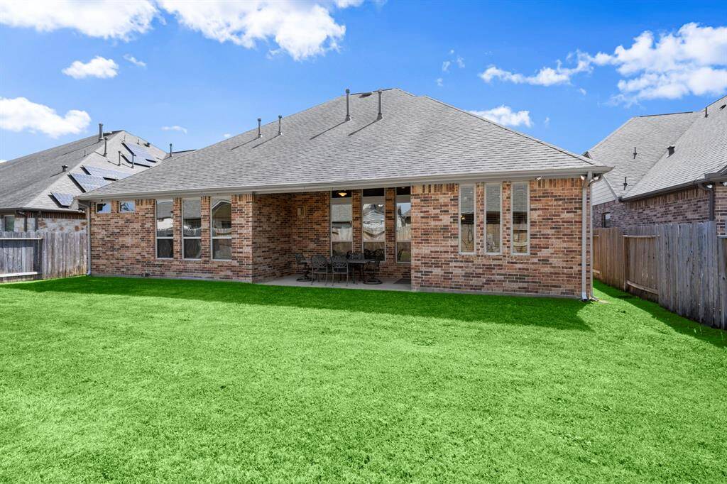Sprinkler system ensures a well-maintained lawn and landscaping.