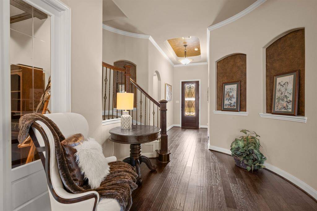 Crown molding and stylish tile flooring create a lasting first impression. Crown molding and stylish tile flooring create a lasting first impression.