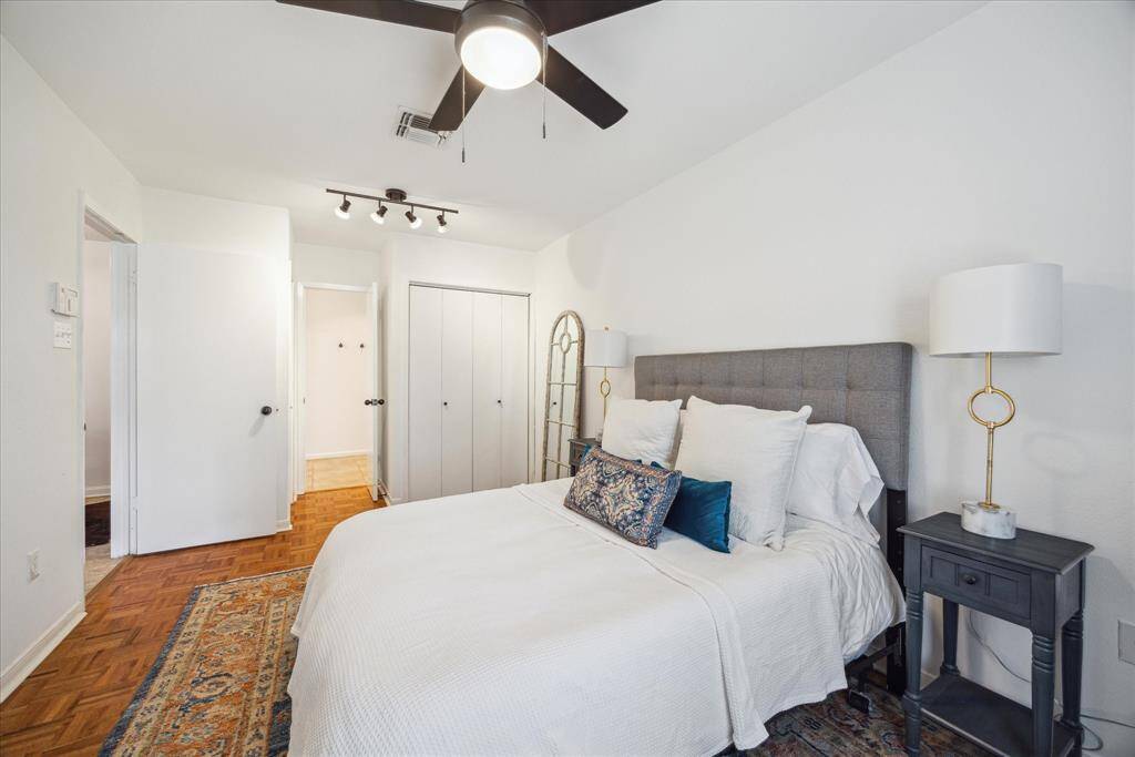 The primary bedroom has 2 closets, both with Elfa shelving which allows for maximum organization and increases storage space.