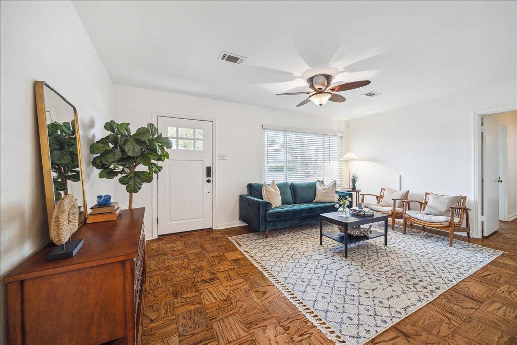 The living room is warm and inviting. The double paned windows allow for ample natural light.