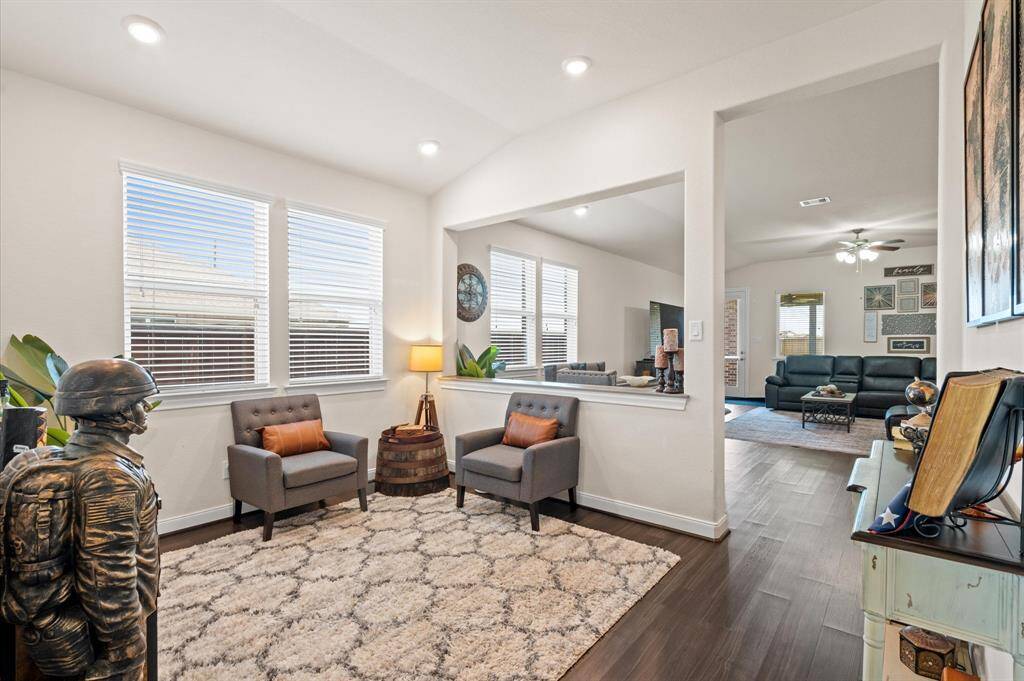 The formal living room could easily serve as a formal dining space if desired.