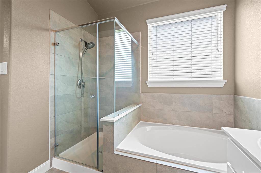 A desirable separate shower includes a removable sprayer for your convenience.