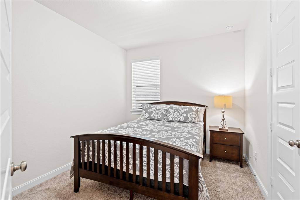 Bedroom 2 is ideal for any family member. It is located close to the primary suite.