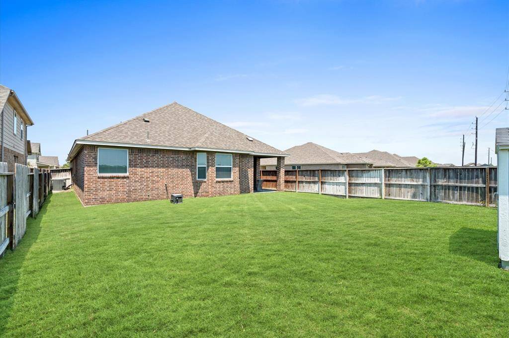 A HUGE backyard is ready for your design, be it a garden, some landscaping, a fire pit and seating, or even a pool!