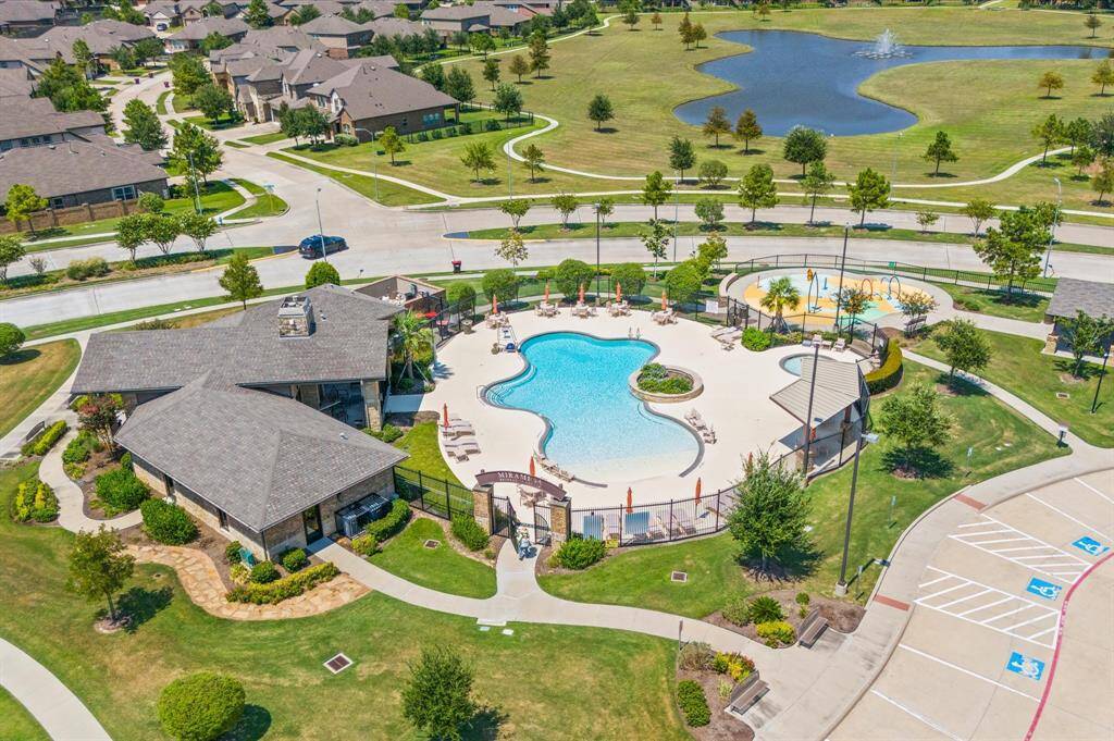 HOA fees contribute toward plenty of neighborhood amenities including a basketball court, dog park, playground, pool, splash pad, tennis court, and trails.