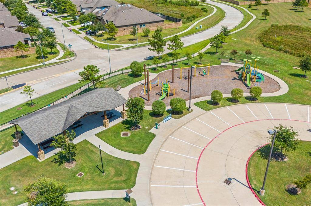 The park rests near a covered pavilion for a shady respite or picnic lunch. You're going to love it here! Welcome home.