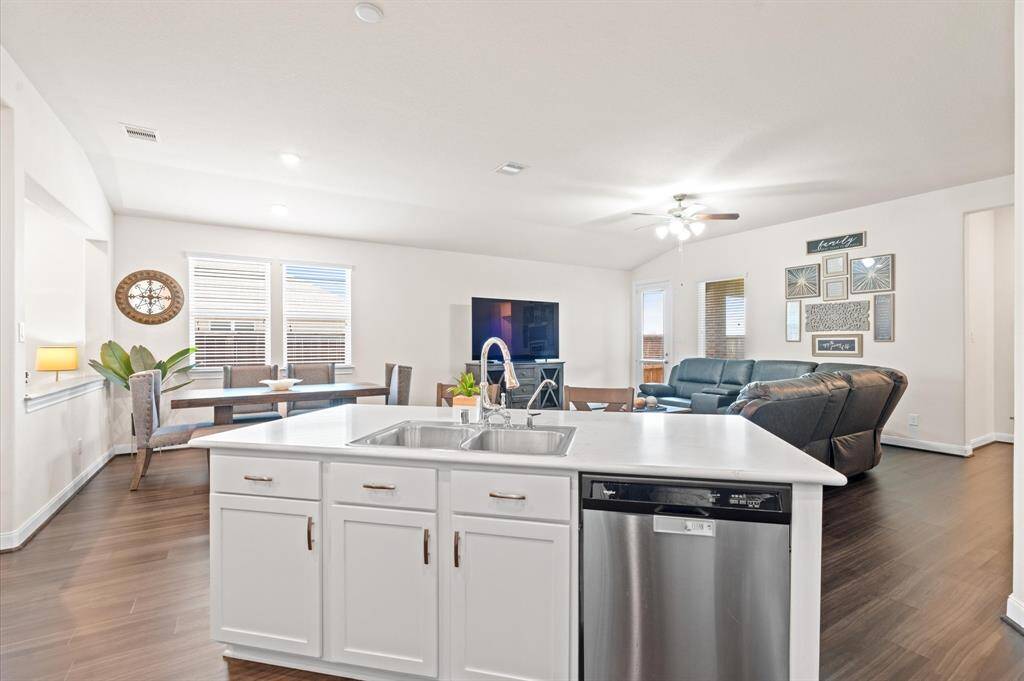 The kitchen overlooks the breakfast room and family room providing a welcoming, all-inclusive setting. An abundance of natural light adds to the beautiful design.