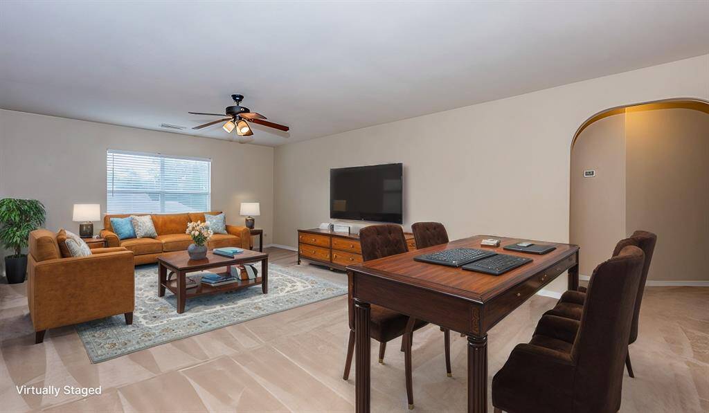Upstairs gameroom could be second living area or home office