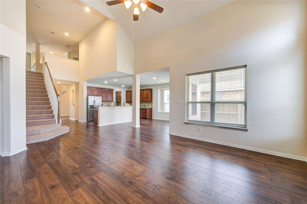 Lovely wooden floor highlights the practical elegance of the home.