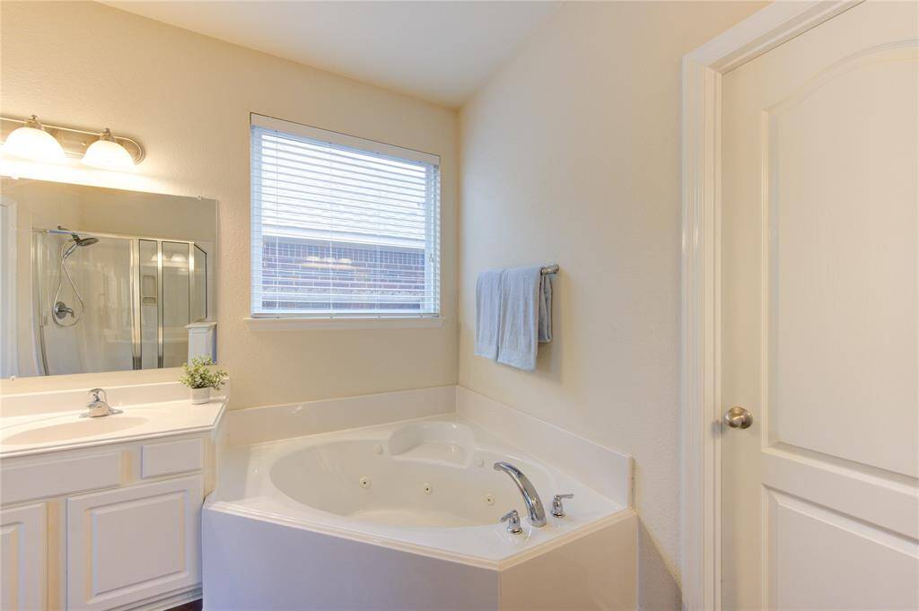 Get ready to forget about routine in this grand soaking tub!