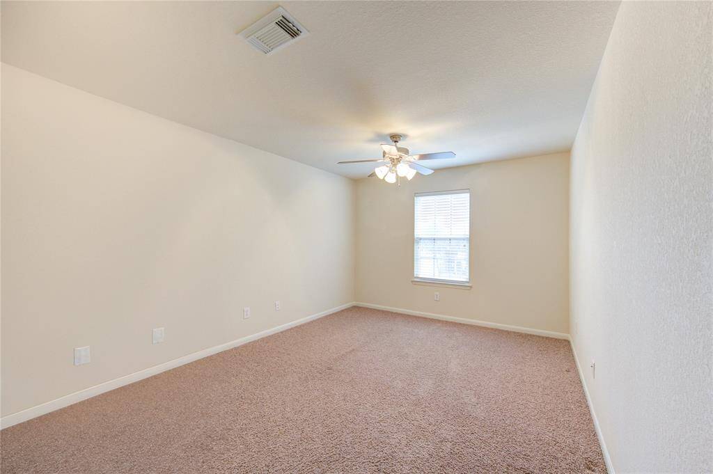 Retire to this charming bedroom and enjoy a quiet, delightful space all your own.
