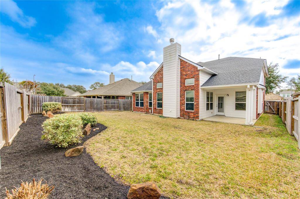 Lovely landscaping and plenty of space for outdoor activities and games.