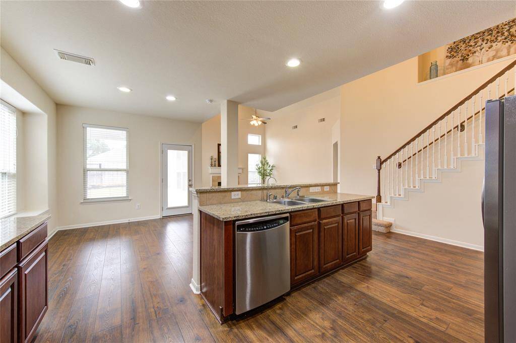 Don't miss what's going on in the living room while you're cooking - perfect for entertaining!