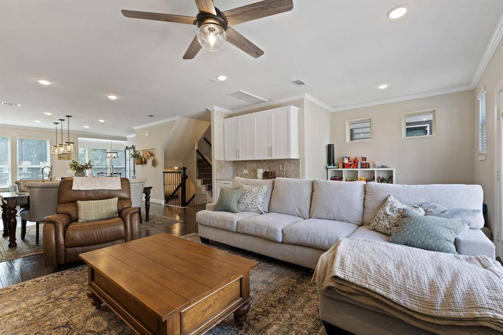Huge living area with wet bar.  Extra space off living area currently a play area is also perfect for extra office space.